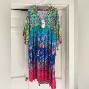 Johnny Was (California) midi length floral dress with wide bell sleeves.